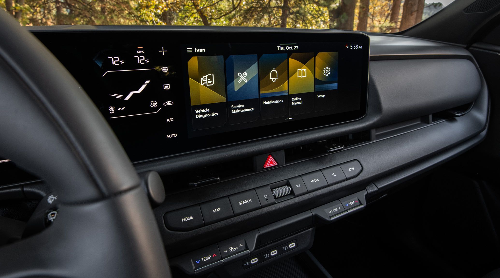 Interior close-up of the center digital display panel inside the 2027 Kia Seltos SUV, showing a menu screen with vehicle diagnostics, service maintenance, notifications, the online manual, and more, as well as climate controls.