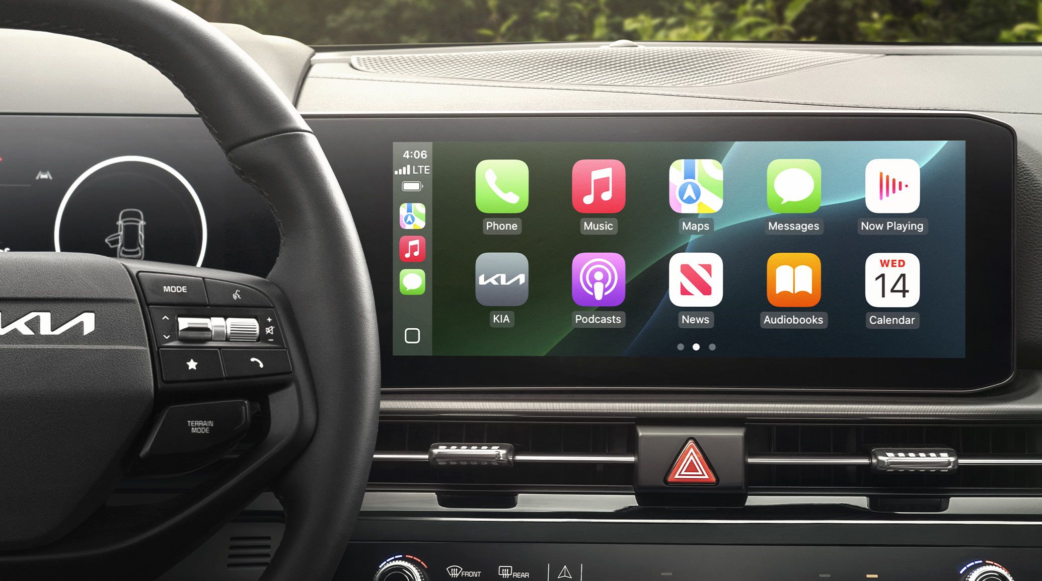 2027 Kia Sportage Hybrid interior, zoomed-in view of the infotainment screen with Apple CarPlay turned on, featuring popular apps like music, podcasts, maps, and messages on the screen.